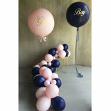 Boy + Girl Gender Reveal Giant Balloons in Navy + PinkGender Reveal Latex Garland Kit | Includes 36 inch navy balloon with custom gold boy decal, 26 inch balloon with gold girl gold decals, 8 foot latex balloon garland and coordinating ribbon