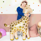 girl hugging giraffe foil balloon