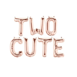 Balloon letters spelling out TWO CUTE in rose gold