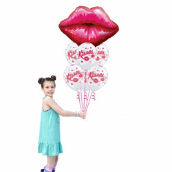 Girl holding a Set 7 red lips and kisses balloon bouquet for a stylish birthday, valentines day or bridal shower gift or decoration