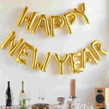 Happy New Year Balloons shown in gold