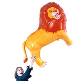 Girl holding Lion Foil Balloon