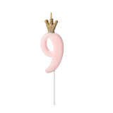 Pink number 9 cake candle with gold glitter crown and on a plastic pick