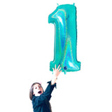 Seriously glittery teal blue number 1 balloon.  This balloon is a show stopper for 1st birthdays or one parties!