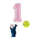 Girl holding Giant Pastel Pink Number 1 Balloons