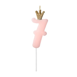 Pink number 7 cake candle with gold glitter crown and on a plastic pick