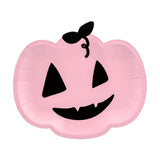 Pink pumpkin paper plates printed with black jack-o-latern-face