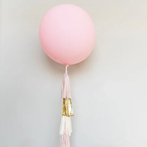 matte pale pink latex balloon with issue tassel tail in blush pink, gold and ivory