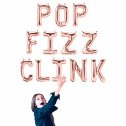 Girl Holding a FIZZ POP CLINK Balloons - Rose Gold - Gold - Silver - Pink - Blue