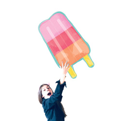 Girl holding large Popsicle Balloon 30 IN  in pink, red and orange with teal edging