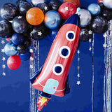 Red and blue rocket ship party balloon with an outer space party theme latex balloon garland