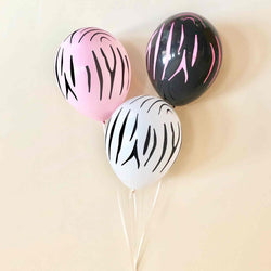 Zebra print latex balloons in pink, black and white
